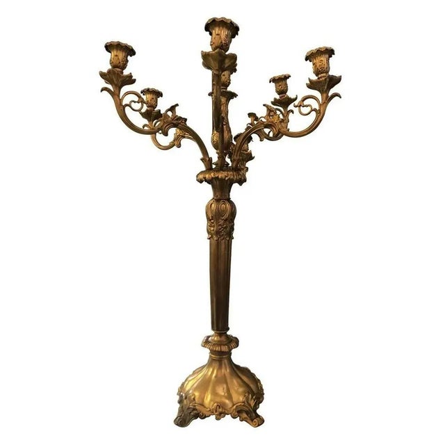 Pair of 7 Light Bronze Candelabras stand tall and are great or a large setting. The candle holders are removable if seen...