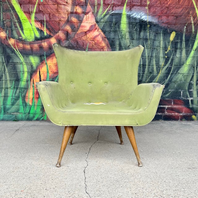 Vintage lounge chair by Karpen of California. This piece is being sold strictly as-is and is best suited for reupholstery...