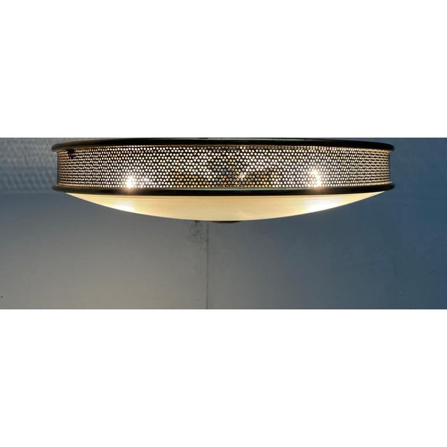 Mid-Century Modern German Metal, Mesh and Glass Plafoniere Pendant Lamp, 1960s, in Very Good conditions. Designed 1950 to...