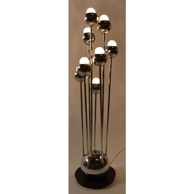 Post Modern Art Deco Revival decorative table lamp. The three way switch enables three distinct light combinations. Bright...