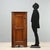 Walnut corner cabinet dating from the late 19th century, originating from Italy. Featuring a paneled and bipartite front...