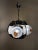 Vintage pendant light made of blown Murano glass, an Italian craftsmanship from the 1970s. The diffuser features a subtle...