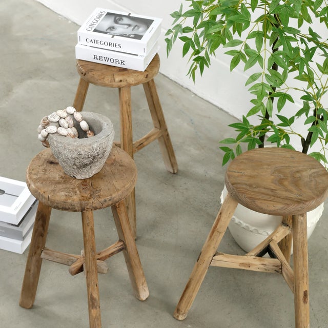 Add a touch of history and charm to your space with this Mid-Century Vintage Natural Wood Round Low Stool. Each stool...