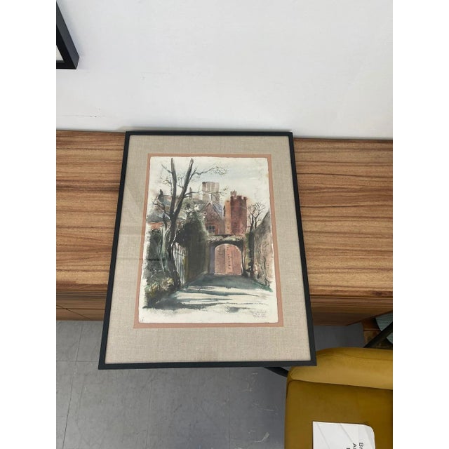 This beautiful watercolor on paper Shows a viewpoint of buildings through an archway. Signed, dated, and titled in the...