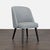 The curves of the wraparound back highlight the thin, tapered wood legs and welted fabric. Brand: Room & Board. Original...