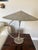 This sculptural lamp reflects the minimalist and avant-garde design aesthetics prevalent in the mid-to-late 20th century....