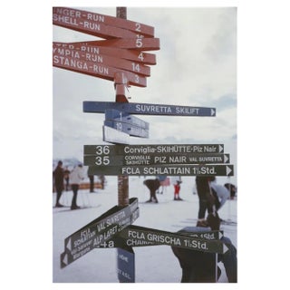 Slim Aarons, Signpost in St Moritz, Estate Stamped Photographic Print, 1963 / 2020s For Sale