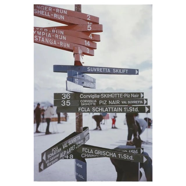 Slim Aarons, Signpost in St Moritz, Estate Stamped Photographic Print, 1963 / 2020s For Sale
