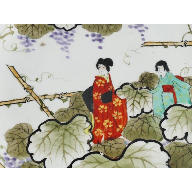 Black Meiji Hand-Painted Kutani Porcelain Charger with Women and Vine Arbor, 1920s For Sale - Image 8 of 18