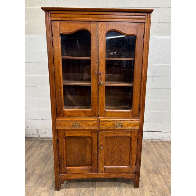 This is a beautiful and rustic antique Victorian Early American pie safe or kitchen cupboard, cabinet, or pantry, believed...