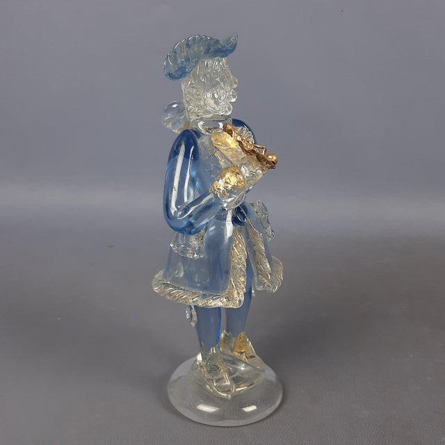 Splendid vintage decorative statue, Goldonian figure sculpture with fan in Murano glass and brass, light blue and...