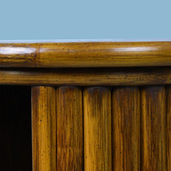 A clever and beautiful accent — this rotating side table by McGuire is crafted from warm honey-brown bamboo and rattan....