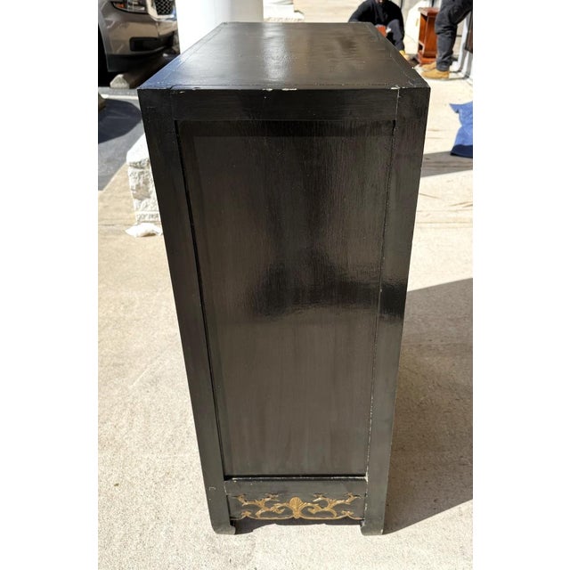Late 20th Century Heavily Carved Black Asian Cabinet With Gold Doors and Red Interior For Sale In Raleigh - Image 6 of 13