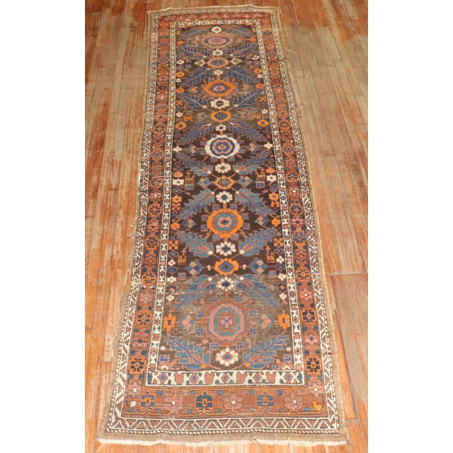 an early 20th century worn Persian Kurd Runner Details rug no. j3095 size 3' 3" x 12' (99 x 366 cm) rug type Kurd
