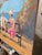OIl painting of vintage couple sitting on a park bench near the beach.. It appears that it may be a first date or perhaps...