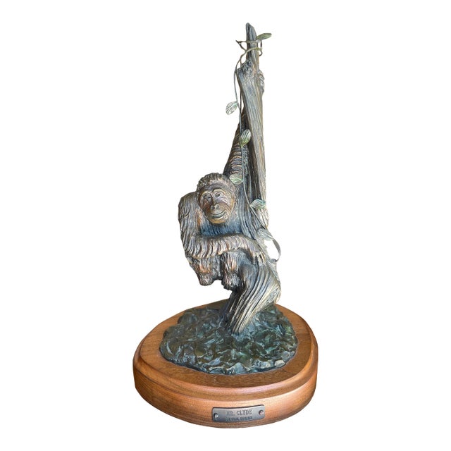 "Mr. Clyde": A Bronze Gorilla Hanging From a Tree Sculpture by Artist Carl Wagner For Sale