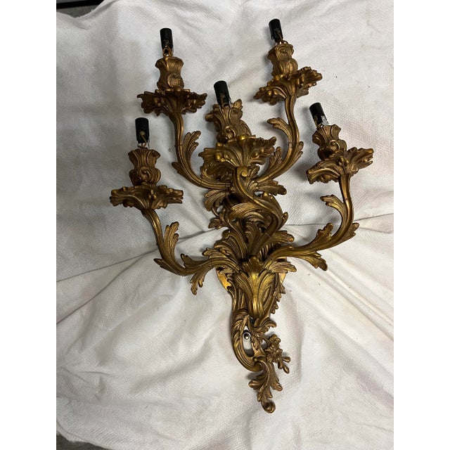 Pair of Early 20th C. solid bronze Rococo-style (5) arm sconces. Very heavy bronze with ornate tulip candle bases and...