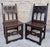 Set of 2 Spanish chairs with wooden seats on walnut and sycamore structure with hand-carved decoration. These chairs are...
