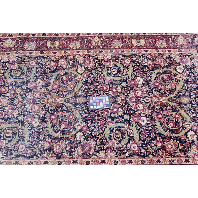SE Persian city, famous since 17th century for an artistic variety of scatter rugs and large carpets in medallion and...