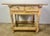 18th century bleached walnut Spanish Colonial table with two drawers. The four legs are connected by a stretcher. The two...
