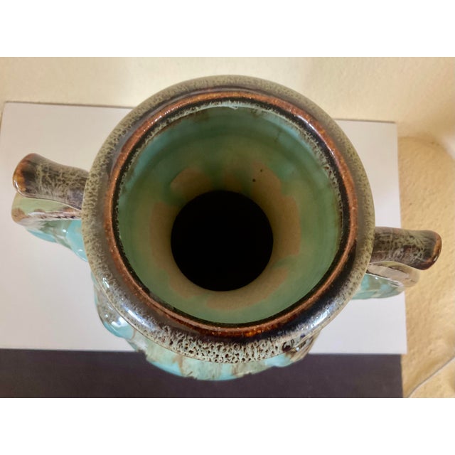 1970s Ceramic Glazed Vase With Elephant Trunks as Handles and Writing on the Bottom of Turquois Color Vessel For Sale - Image 5 of 12