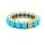 A beautifully crafted eternity band set in 14 karat yellow gold and composed of sixteen vivid Persian turquoise cabochons....