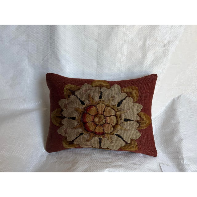 This charming decorative pillow has been created from an authentic 18th century French Aubusson tapestry fragment...
