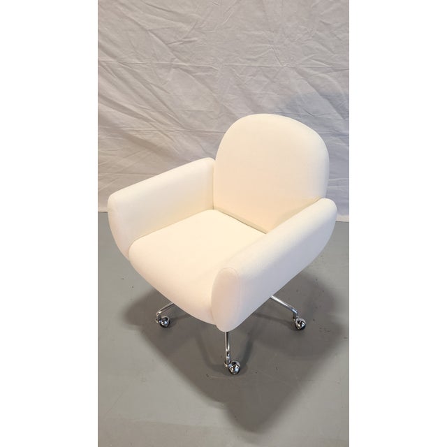 This is a very comfortable office chair in Ivory, beautiful chrome base and casters.
