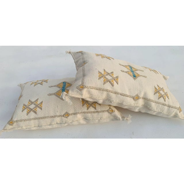 PILLOW DESCRIPTION: This cactus pillow was made purely Moroccan by the hands of traditional craftsmen, skilled Berbers,...