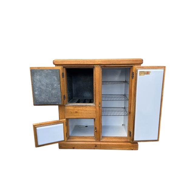 Beautiful antique ice box. Washed out look. Very high quality. Solid and heavy.