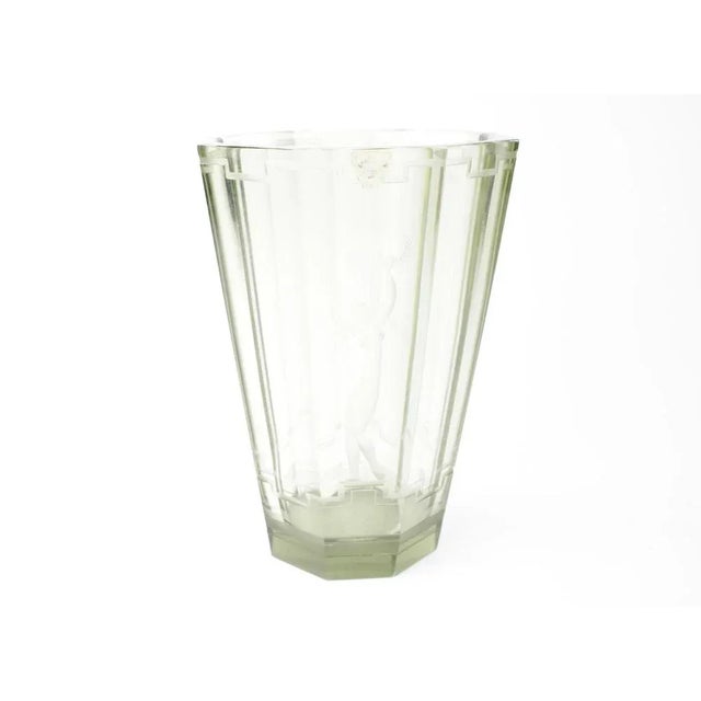 Vicke Lindstrand for Orrefors. Green glass. One minor nib on the foot in one of the corners. This piece is designed in the...