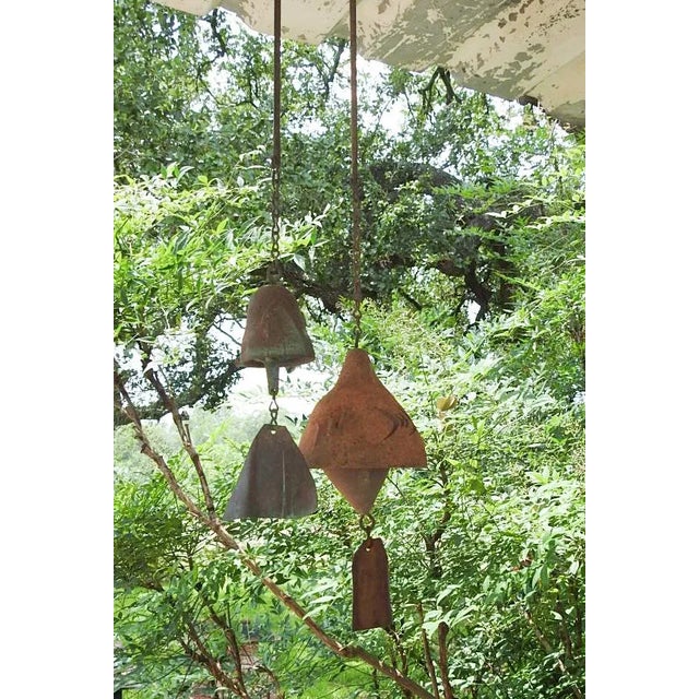 Pair of small vintage mid 20th century cast bronze and pottery wind chimes by Paolo Soleri. Heavy overall patina, copper...