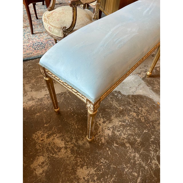Up for consideration is a beautiful vintage long gilded golden wooden bench with a light blue velvet cushion. This piece...