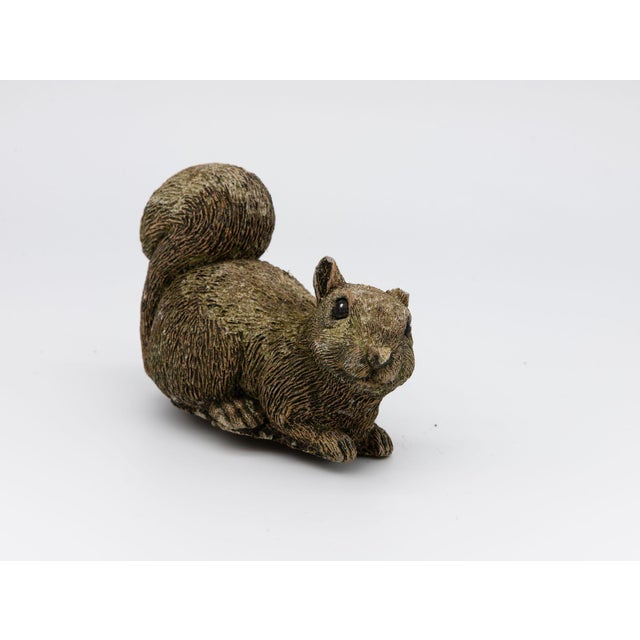 This English 20th-century squirrel garden statue has a warm, lifelike presence, sculpted with gentle detail and a textured...
