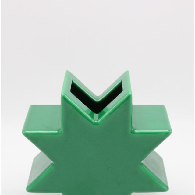 "Hsing" vase designed by Ettore Sottsass for Alessio Sarri, Sesto Fiorentino. Green glazed ceramic.