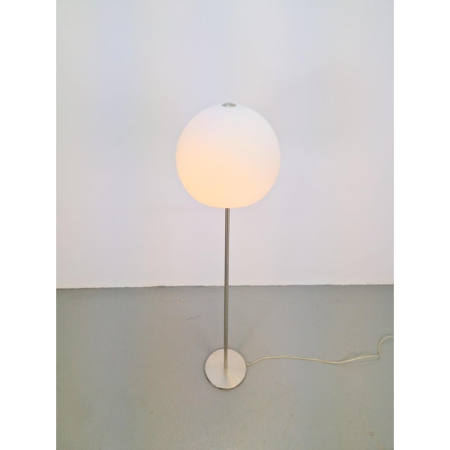Vintage Opaline glass globe floor lamp by Hufnagel Leuchten Germany, 1970 Sleekly designed large white glass globe floor...