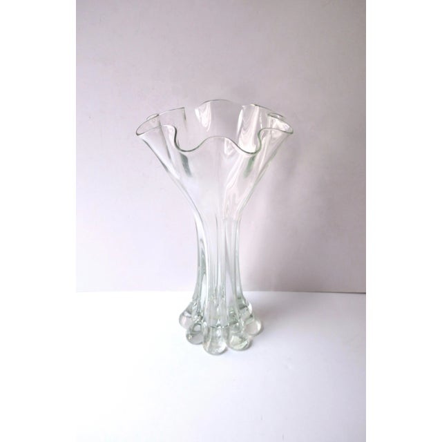 A beautiful, substantial, and relatively tall clear transparent hand-blown art glass vase, Organic Modern, circa mid to...