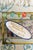 “Love Is A Seriously Strong Drug” – Large Decorative Platter by Tatiana Alida A quote close to Tatiana’s heart, this bold...