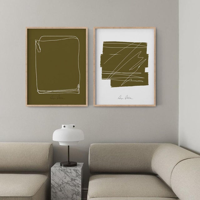 Set of 2 abstract open edition giclee prints. 20"x28" Elegant and bold black geometrical forms drawing in khaki and white...