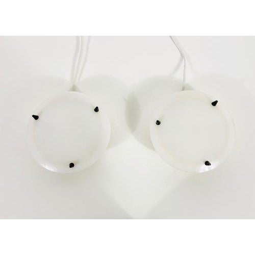 A pair of beautiful mid-century modern wall lamps made in germany in the 1960s. They can perfectly be mounted on the wall....