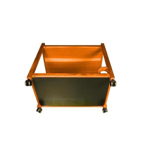 A classic mid-century teak serving bar cart made in Denmark, circa 1960s. Beautifully crafted from teak, this cleverly...