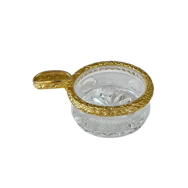 Very chic! Personal size cut glass and brass mounted French ashtray. Charming small size Fleur de Lis pattern. Sourced in...