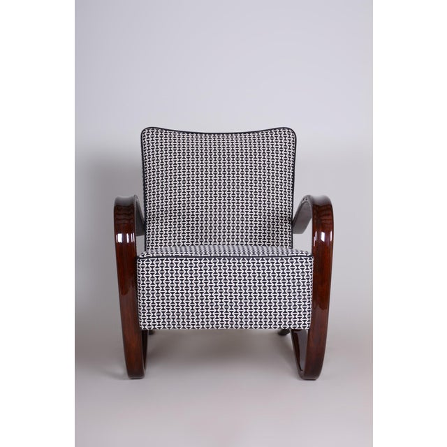 This iconic pair of armchairs, originating from the 1930s, represents an extraordinary, highly valued, and collector-...