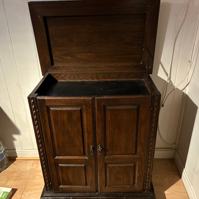 vintage solid-wood liquor cabinet / bar cabinet with an original bottle & glass holder inside