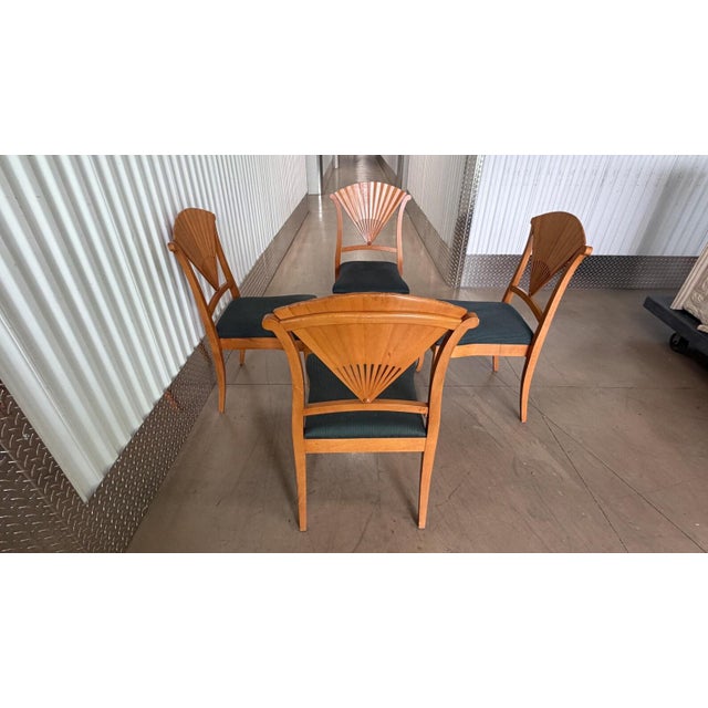 We have sold this design before and actually they ended up in a museum. These are a set of 4 carved wood chairs with the...