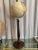 Beautiful and stylish vintage wood footed, soft tan colored terrestrial globe. National Geographic 2009. Made in USA.