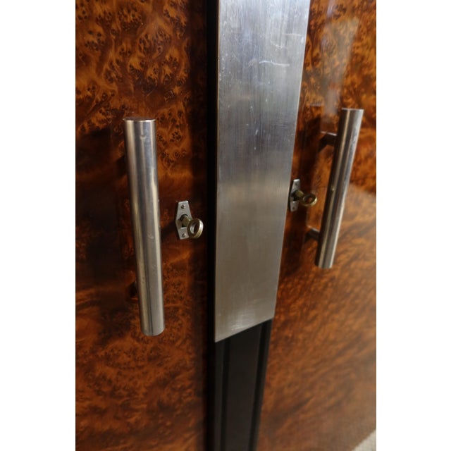 Art deco wardrobe superb little wardrobe in elm burl and blackened wood with two doors. This cabinet has just been...