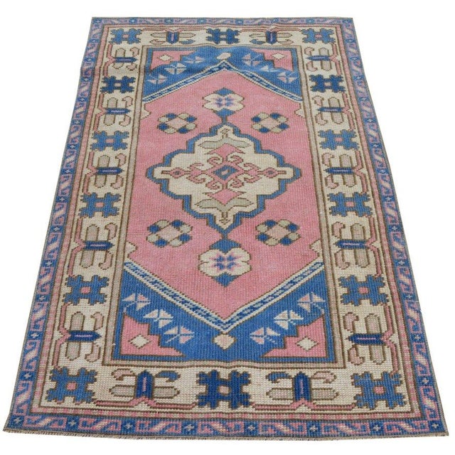 Hand-knotted with care using traditional rug-making techniques, this wool rug blends timeless craftsmanship with a modern...