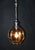 A distinctive mid-century pendant light dating to circa 1960s, featuring a striking geometric globe constructed from...