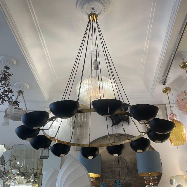 Large ring-shaped ceiling lamp from the 1960s-70s in the Stilnovo style. The distinctive design of this lamp features a...